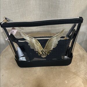 Victoria’s Secret Fashion Show 2025  Black and Gold Winged Bag